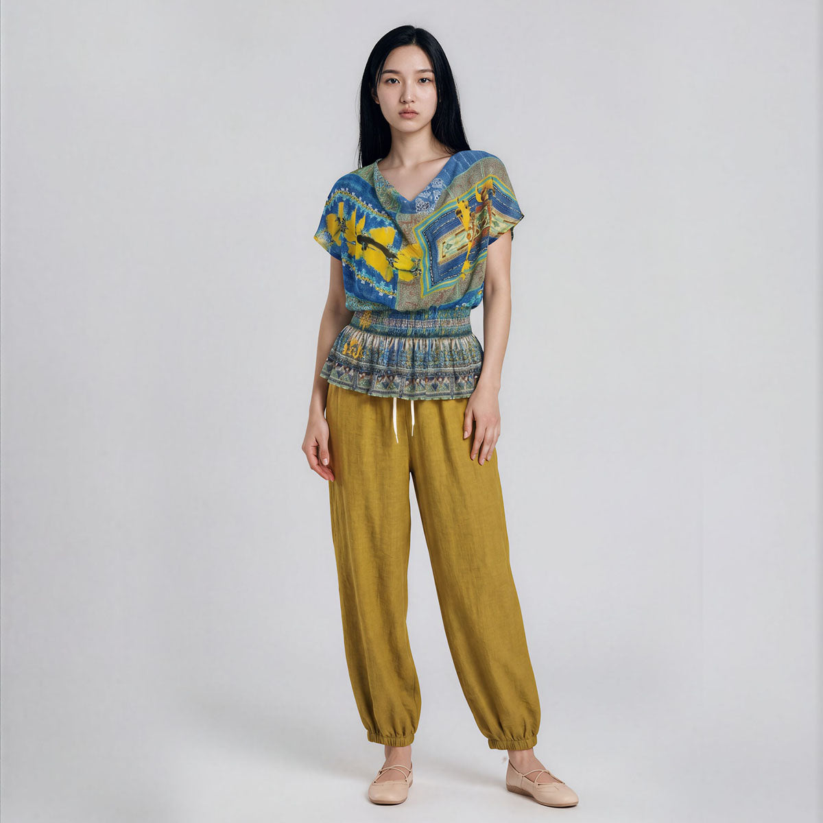 Rhapsody Print Cowl Neck with Peplum Blouse
